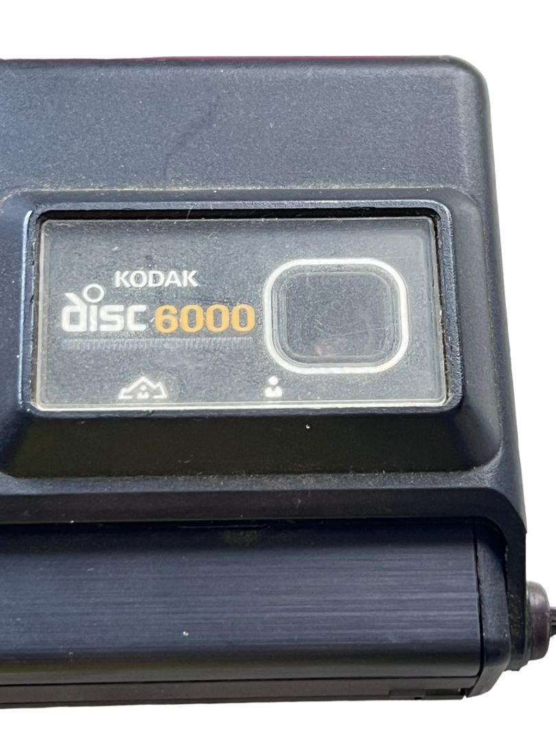 Vintage Kodak Disc 6000 Camera Black Chain Wristlet Sounds like it is in working condition