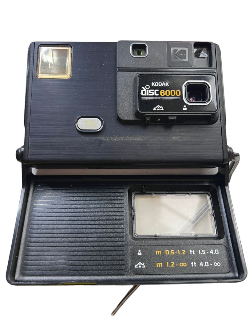 Vintage Kodak Disc 6000 Camera Black Chain Wristlet Sounds like it is in working condition