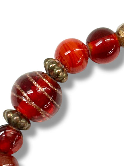 Acrylic Beaded Stretch Bracelet Shades of Red Goldtone