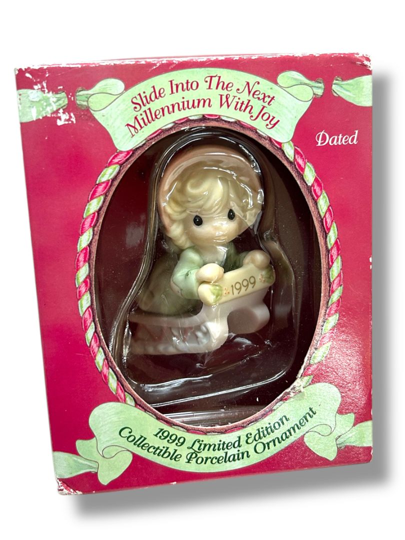 Dated 1999 Enesco Precious Moments 587788 Ornament "Slide into the Next . . ."