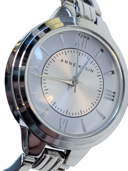 Anne Klein Women's AK/1441 Y121E Silver Tone Open Bangle Watch