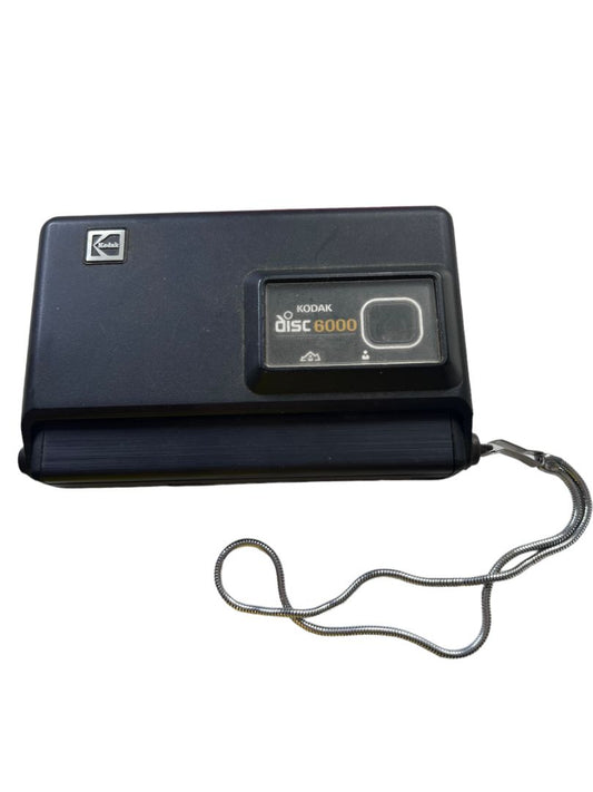 Vintage Kodak Disc 6000 Camera Black Chain Wristlet Sounds like it is in working condition