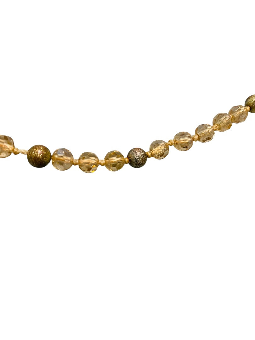 Goldtone and Beige Crystal Knot Necklace Tassel 40" Overhead