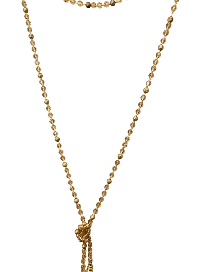 Goldtone and Beige Crystal Knot Necklace Tassel 40" Overhead