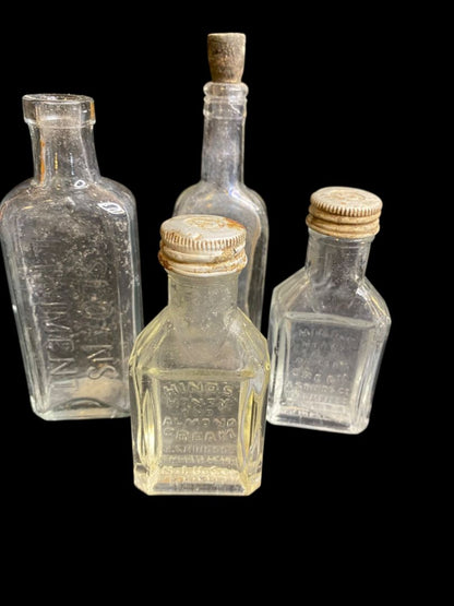 Lot of 4 Vintage Clear Glass Bottles Sloans Linament Hinds Honey