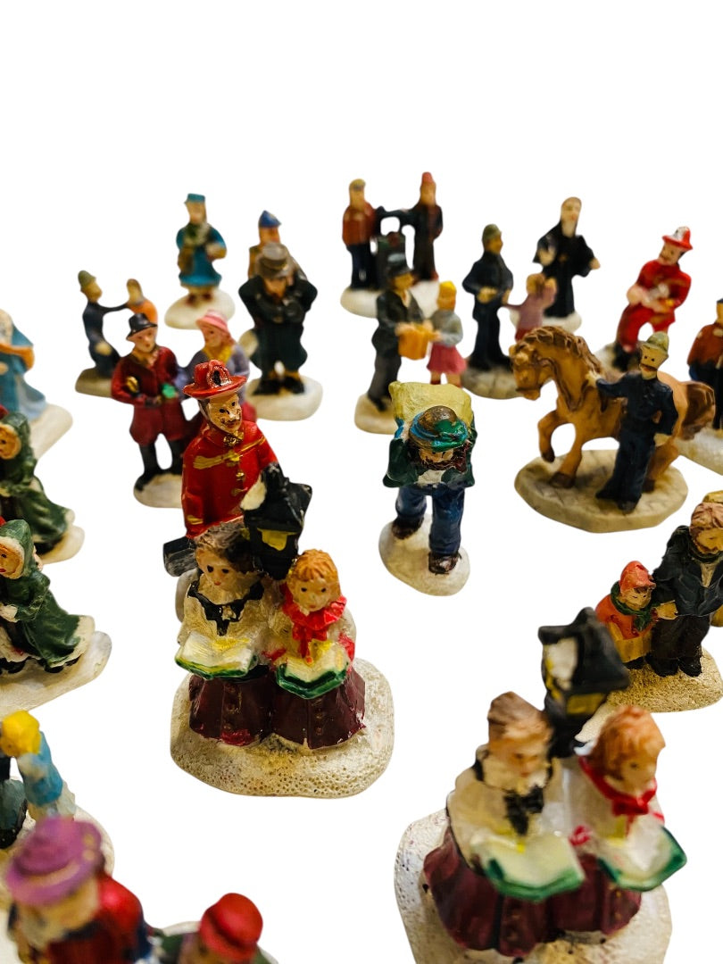 Lot of 31 Assorted Resin Christmas Village Figurines 1.25-1.75"