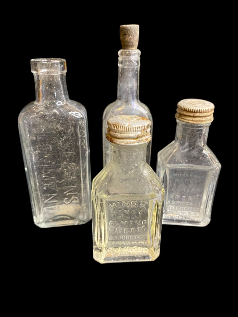 Lot of 4 Vintage Clear Glass Bottles Sloans Linament Hinds Honey