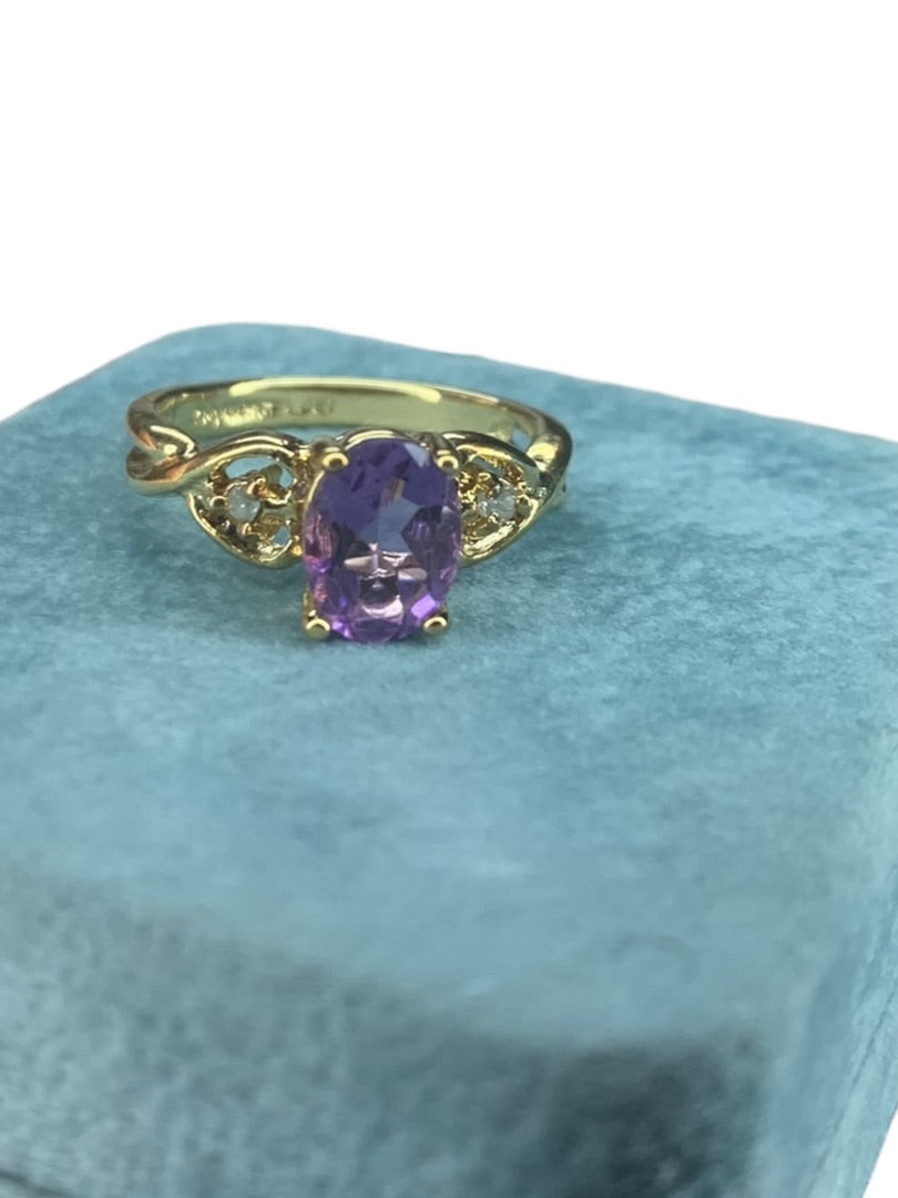 Size 6.5 Goltone Costume Jewelry Ring Purple Glass Solitaire Setting Oval