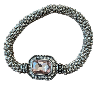 Silvertone Roll On Stretch Bracelet Pink Faceted Glass