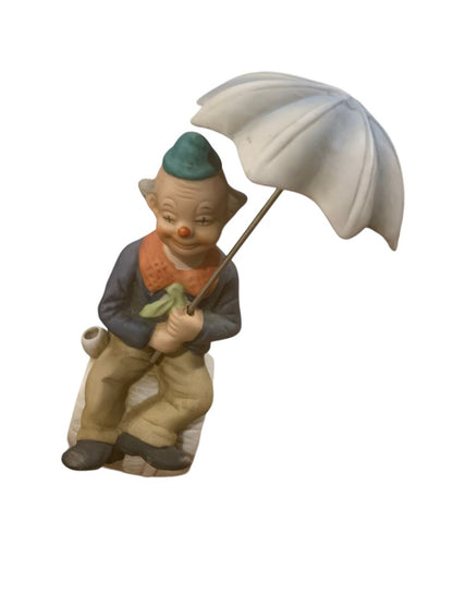 Vintage 1970s Clown Sitting on Barrel Holding Umbrella 8" Porcelain Figurine