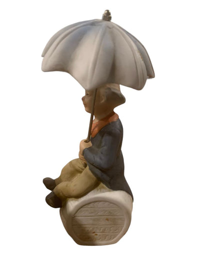 Vintage 1970s Clown Sitting on Barrel Holding Umbrella 8" Porcelain Figurine
