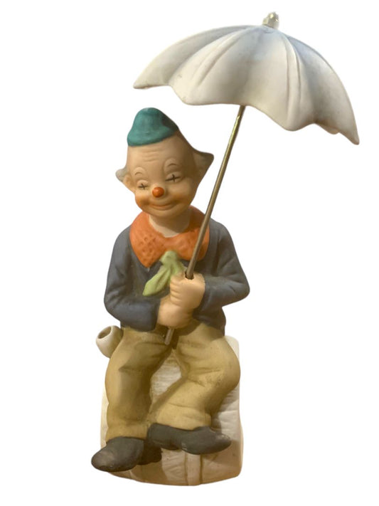 Vintage 1970s Clown Sitting on Barrel Holding Umbrella 8" Porcelain Figurine